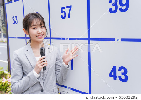 Young woman giving an election speech 63632292