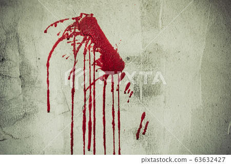 Splatter of red blood on wall in abandoned house. Splatter of red blood on wall in abandoned house. 63632427