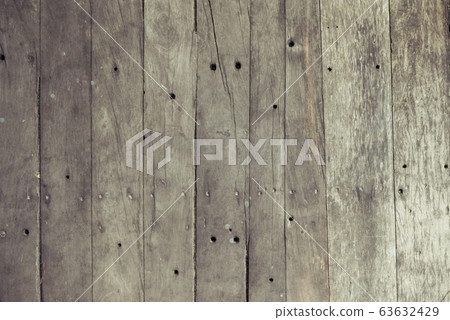 Closeup of old brown wooden plank texture Closeup of old brown wooden plank texture 63632429