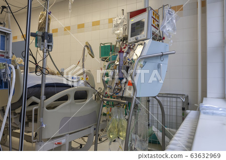 Dialysis machine in ICU in hospital, a place where can be treated patients with pneumonia caused by coronavirus covid 19. Dialysis machine in ICU in hospital, a place where can be treated patients with pneumonia caused by coronavirus covid 19. 63632969