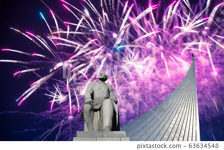 A statue of Konstantin Tsiolkovsky and Conquerors of Space Monument and fireworks, Moscow, Russia A statue of Konstantin Tsiolkovsky and Conquerors of Space Monument and fireworks, Moscow, Russia 63634548