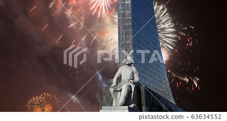 A statue of Konstantin Tsiolkovsky and Conquerors of Space Monument and fireworks, Moscow, Russia A statue of Konstantin Tsiolkovsky and Conquerors of Space Monument and fireworks, Moscow, Russia 63634552