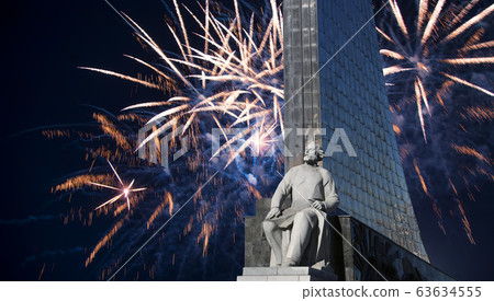 A statue of Konstantin Tsiolkovsky and Conquerors of Space Monument and fireworks, Moscow, Russia A statue of Konstantin Tsiolkovsky and Conquerors of Space Monument and fireworks, Moscow, Russia 63634555