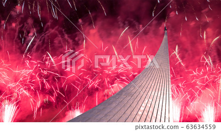 Conquerors of Space Monument in the park outdoors of Cosmonautics museum and fireworks, near VDNK exhibition center, Moscow, Russia Conquerors of Space Monument in the park outdoors of Cosmonautics museum and fireworks, near VDNK exhibition center, Moscow, Russia 63634559