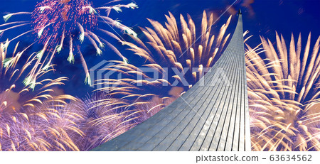 Conquerors of Space Monument in the park outdoors of Cosmonautics museum and fireworks, near VDNK exhibition center, Moscow, Russia Conquerors of Space Monument in the park outdoors of Cosmonautics museum and fireworks, near VDNK exhibition center, Moscow, Russia 63634562
