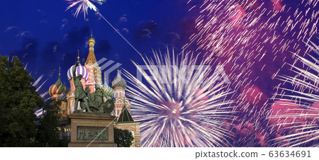 Cathedral of Intercession of Most Holy Theotokos on the Moat ( Temple of Basil the Blessed) and fireworks in honor of Victory Day celebration (WWII),  Red Square, Moscow, Russia. 63634691