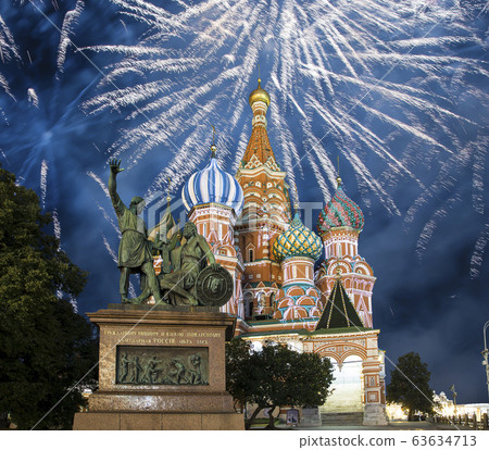 Cathedral of Intercession of Most Holy Theotokos on the Moat ( Temple of Basil the Blessed) and fireworks in honor of Victory Day celebration (WWII),  Red Square, Moscow, Russia. 63634713