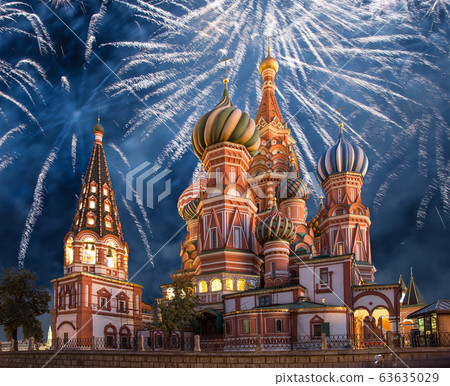Cathedral of Intercession of Most Holy Theotokos on the Moat ( Temple of Basil the Blessed) and fireworks in honor of Victory Day celebration (WWII),  Red Square, Moscow, Russia 63635029