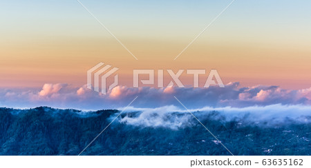 Amazing panorama view on clouds above mountain 63635162
