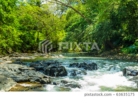 View on mountain river on Tegenungan waterfall on 63635175