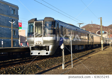Shooting the morning scenery of the limited express Suzuran departing from JR Muroran Station in Muroran City, Hokkaido in early spring Shooting the morning scenery of the limited express Suzuran departing from JR Muroran Station in Muroran City, Hokkaido in early spring 63635245