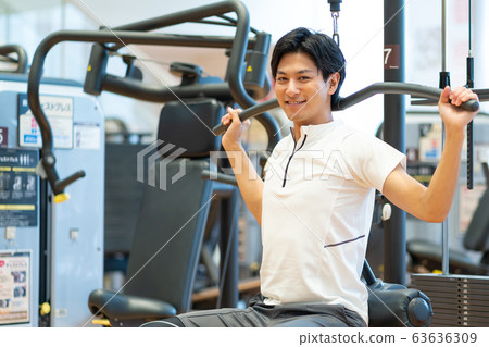 Sports gym young men muscle training sports club Sports gym young men muscle training sports club 63636309