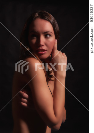Portrait of Woman With Dramatic Lighting 63636327
