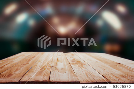Wooden surface on blurry background with spots. Wooden surface on blurry background with spots. 63636870