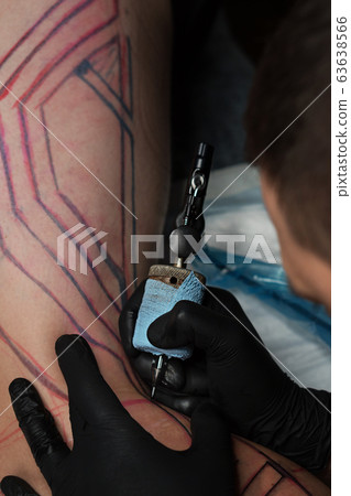 Process of making tattoo close-up Process of making tattoo close-up 63638566