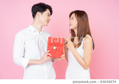 couple with pink background 63638874