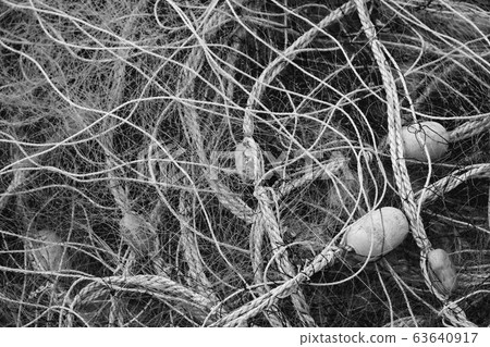 Old fishing net black and white photo Old fishing net black and white photo 63640917