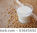 soy milk and soybean on the sack background 63645692