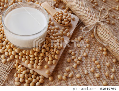 soy milk and soybean on the cutting board soy milk and soybean on the cutting board 63645765
