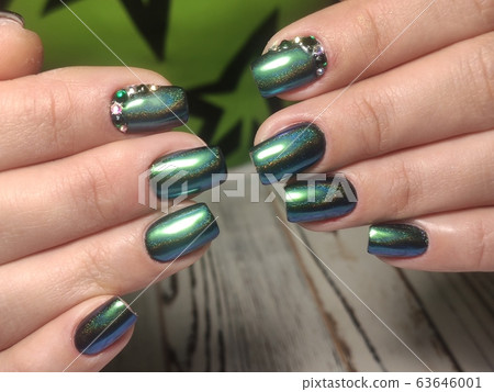 stylish design of manicure on beautiful nails 63646001