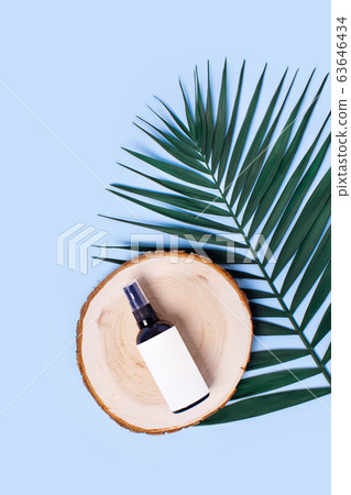 Vertical advertising picture with flowers and can. Vertical advertising picture with flowers and can. 63646434