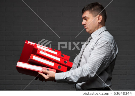 Very busy businessman closeup portrait, posing 63648344