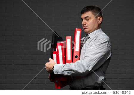 Very busy businessman closeup portrait, posing 63648345