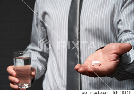 Businessman closeup portrait, he standing and Businessman closeup portrait, he standing and 63648346