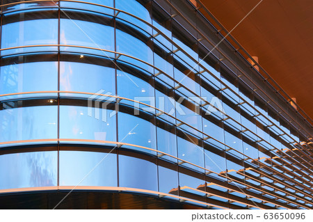 fragment of the glazed facade of a modern building fragment of the glazed facade of a modern building 63650096