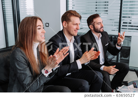 Business people clap their hands, congratulations and appreciation of the concept 63650527