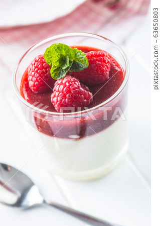 Italian dessert panna cotta with raspberries. Italian dessert panna cotta with raspberries. 63650803