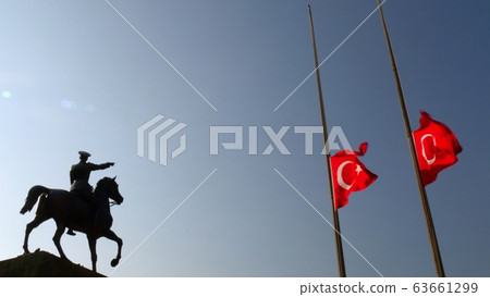 Ataturk riding horse sculpture silhouette and Turkish flag, Ataturk riding horse sculpture silhouette and Turkish flag, 63661299