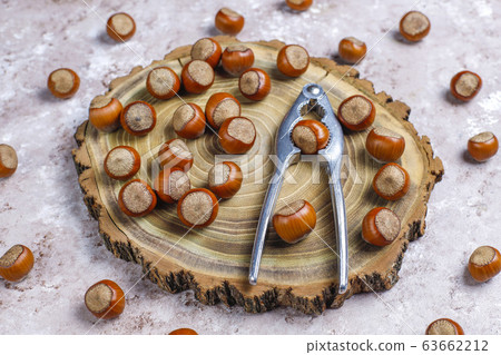 Hazelnuts on concrete background,top view 63662212