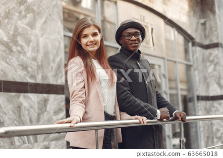 International people in a autumn city International people in a autumn city 63665018
