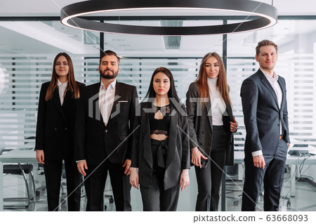 Smiling group portrait of corporate business colleagues 63668093