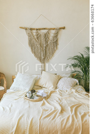 Modern romantic boho style bedroom interior with 63668174