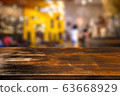 Empty wood table on abstract of blurred restaurant background 63668929