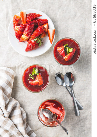 Italian dessert panna cotta with strawberries 63669339