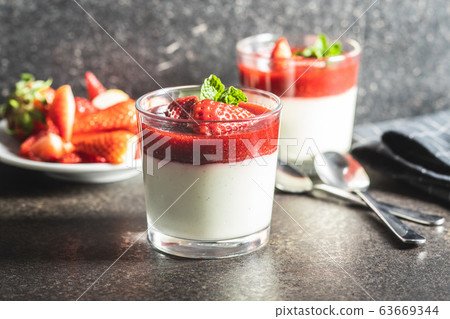 Italian dessert panna cotta with strawberries 63669344