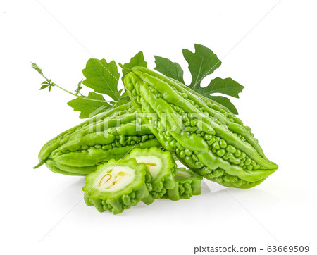 Bitter melon with leaf on white background. full depth of field Bitter melon with leaf on white background. full depth of field 63669509