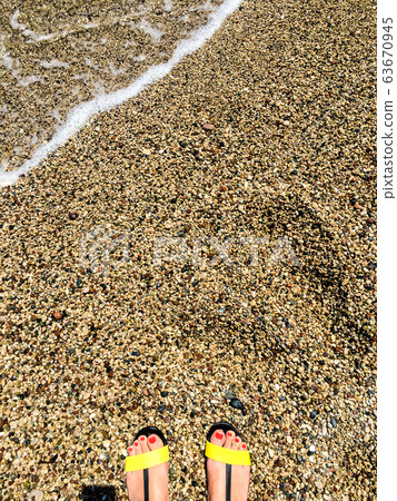 Feet on pebbles Feet on pebbles 63670945