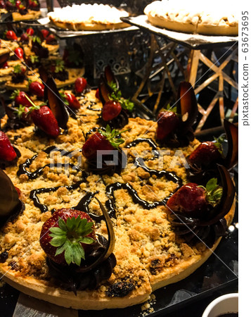 delicious cake with strawberries 63673695