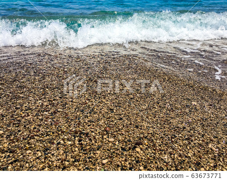 Pebbles and wave Pebbles and wave 63673771