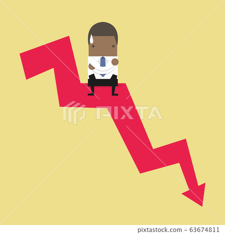African businessman sitting on graph down. 63674811