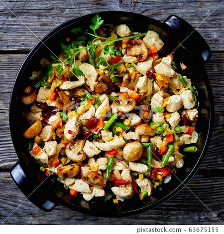 Top view on a baking dish with Mexican vegetables 63675155