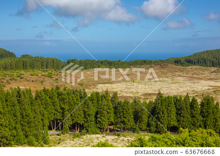 Hills over fields. Terceira island in Azores with blue sky and clouds. Hills over fields. Terceira island in Azores with blue sky and clouds. 63676668