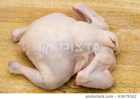 chicken on wood 63679382