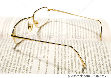 Book ok white with glasses 63679479