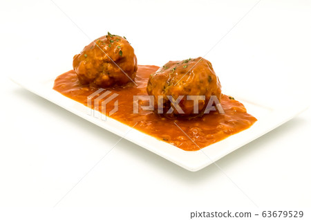 Meatballs cooked in tomato sauce 63679529