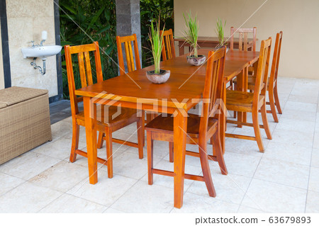 Wooden table and chairs 63679893